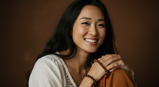 Japanese Yogi in with Meditation Beads smiling at the camera for Vedic Ville 